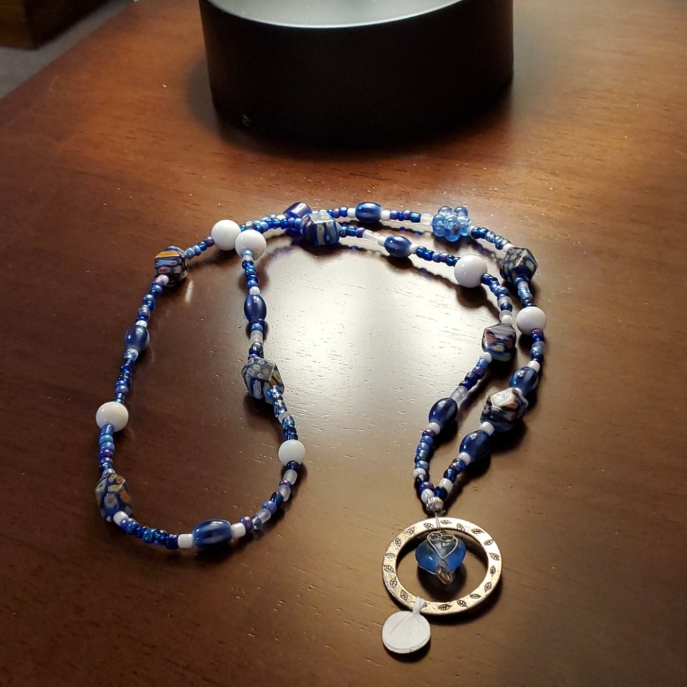 Handcrafted badge/key holder necklace